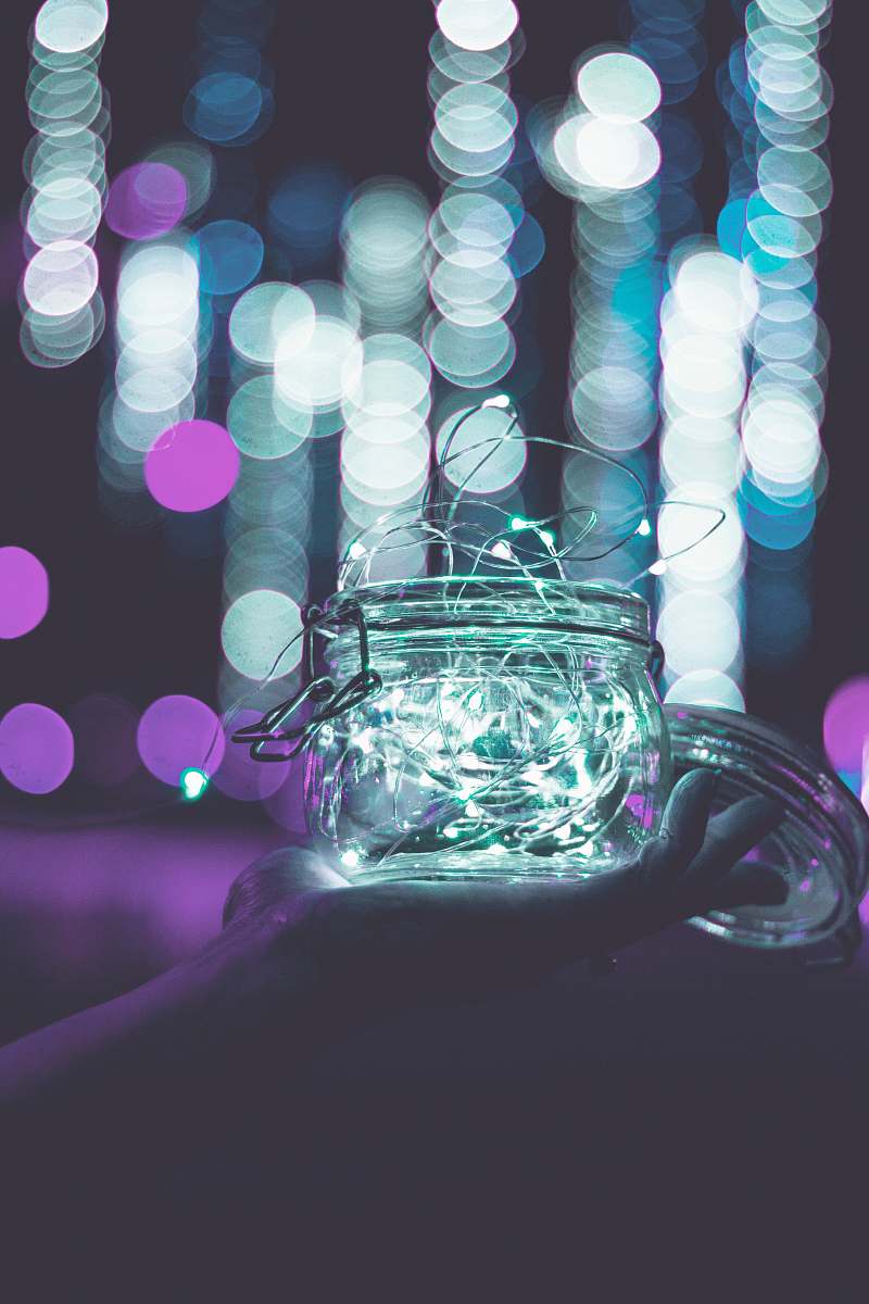 fairy lights clear glass jar with string lights purple